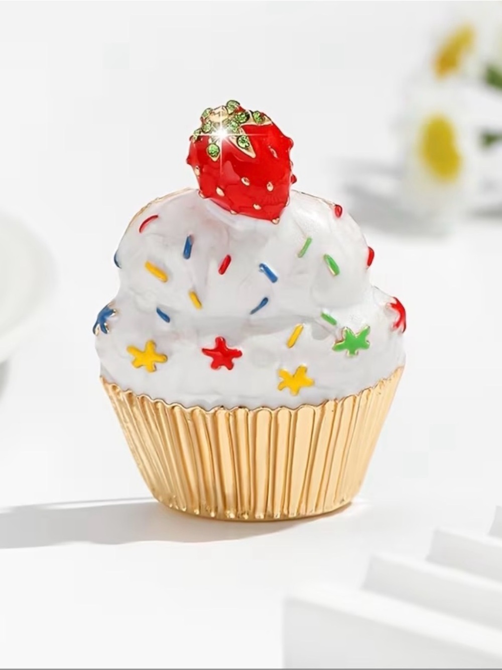 cupcake brooch features a red strawberry on top white icing colorful sprinkles